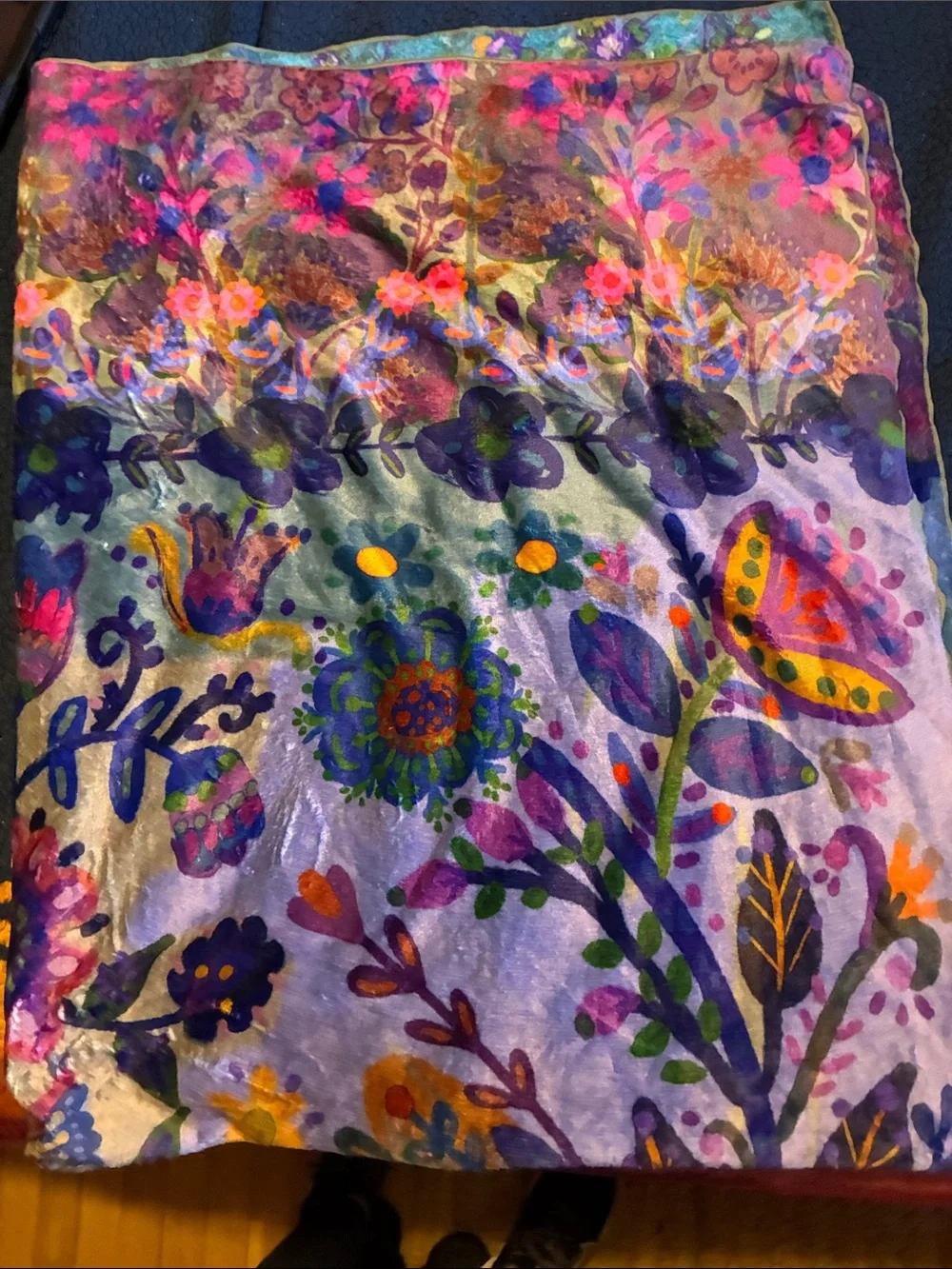 Natural Life features a vibrant Border Folk Garden floral pattern